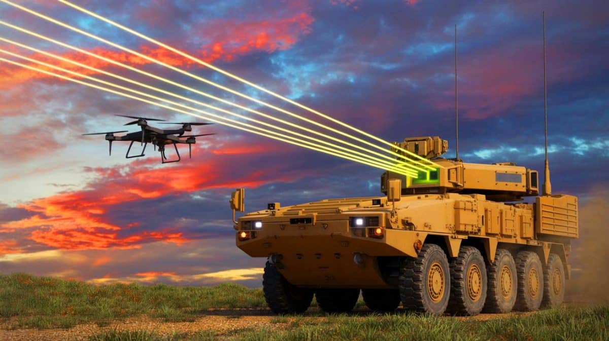 “They’re Building Star Wars Weapons”: Critics Slam US Army’s 50kW Laser Tank That Destroys Drones From 5 Miles Away Illustration of a Stryker vehicle equipped with a 50-kW laser system during a live-fire exercise, generated by artificial intelligence.